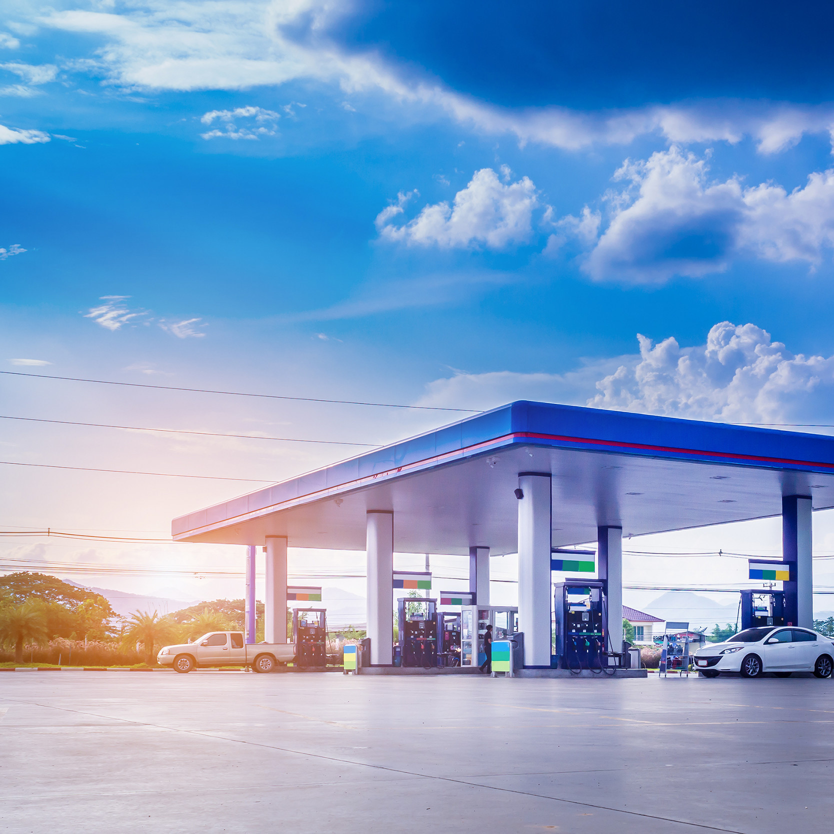 Gas,Fuel,Station,With,Clouds,And,Blue,Sky